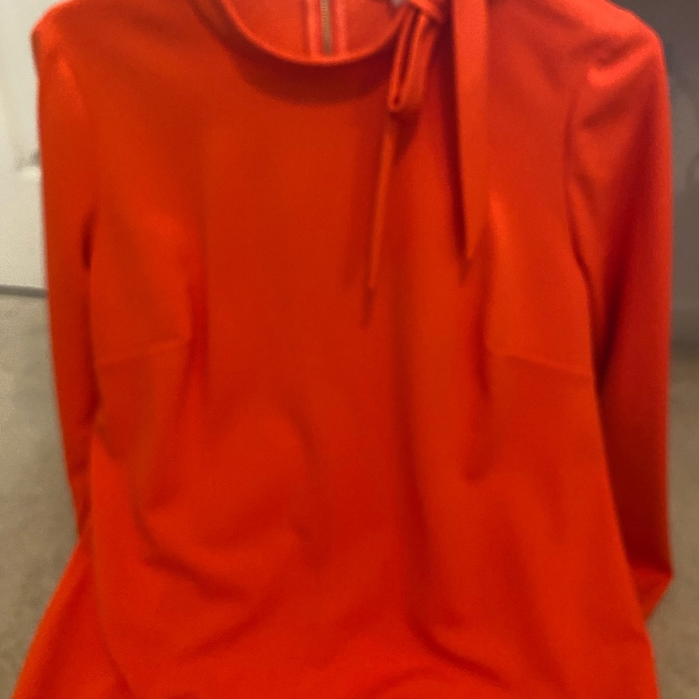 Red Calvin Klein mid length dress with with tie at the neck and zips in the back
